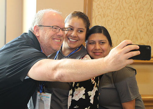 TCEA Members getting a selfie with a board member.